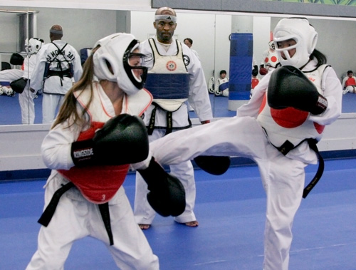 a couple martial arts students having a battle